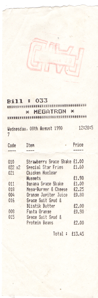 Megatron receipt from 1990, listing items like Strawberry Space Shake, Special Star Fries, Chicken Nuclear Nuggets, and Orange Jupiter Juice